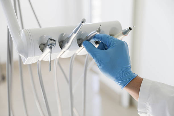 Professional Tooth Extraction technician working in Tripoli, IA